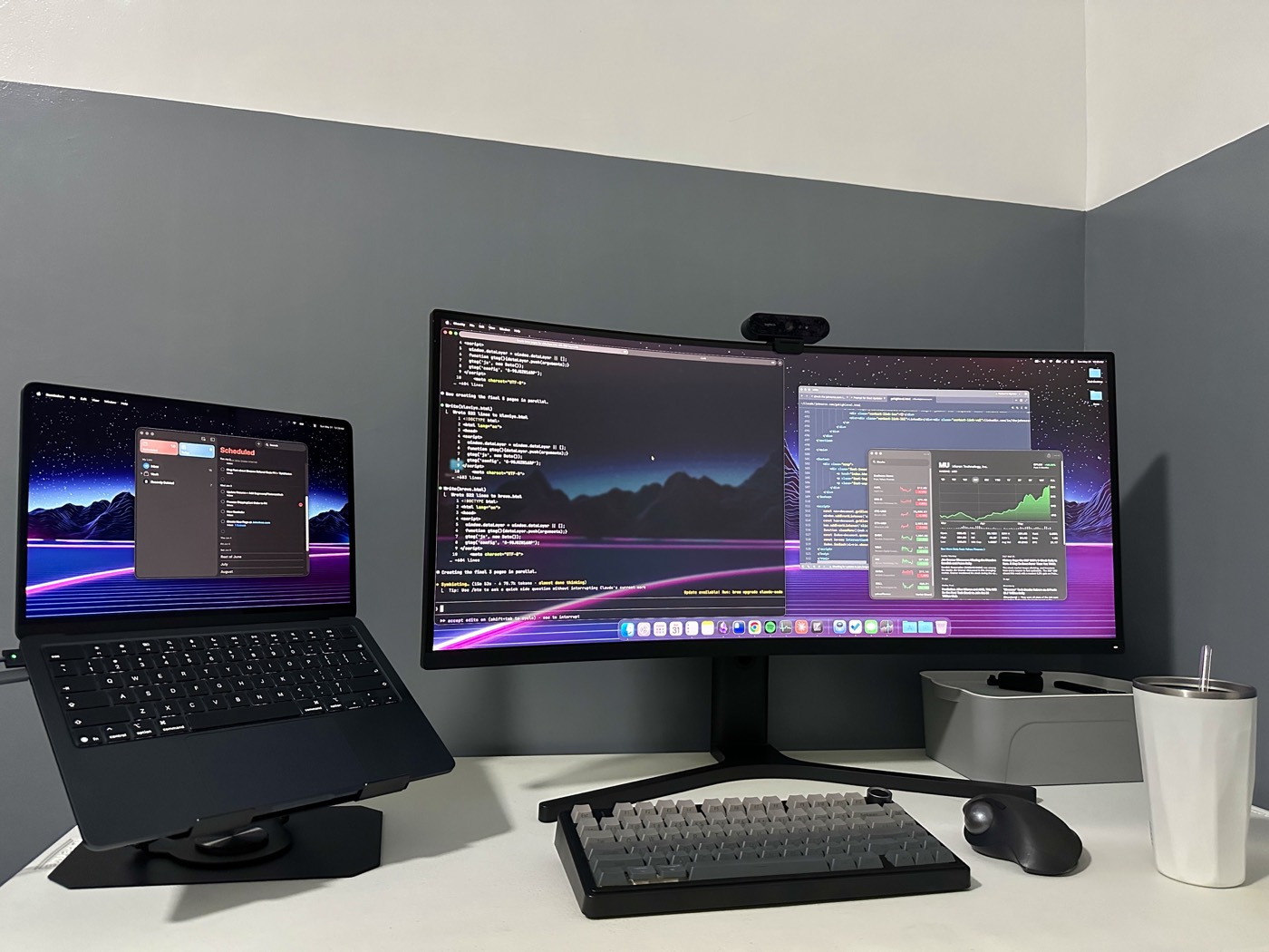 John Arce's home office setup with Claude Code running on the monitor