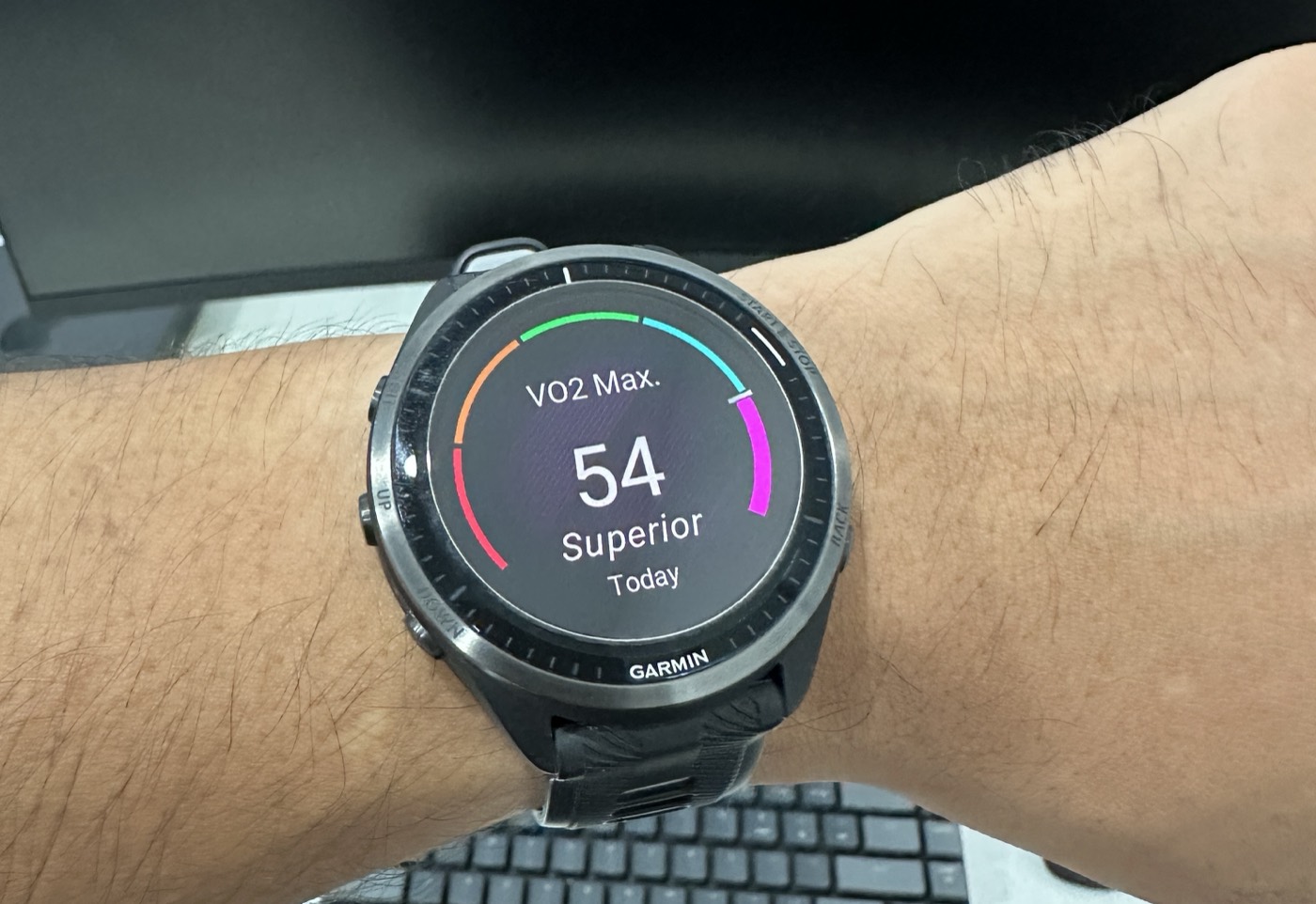 Garmin watch showing a VO2 max reading of 54, rated Superior